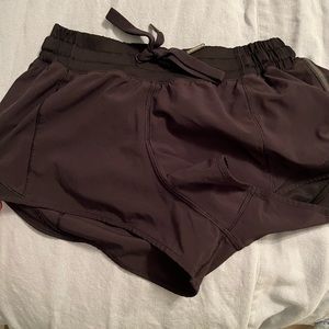 Lululemon black hotty hot shorts size 4. With drawstring - one of my fav styles!